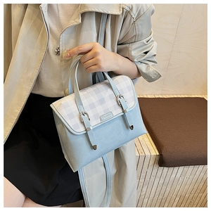 British style light blue plaid backpack featuring metal buckle and Fashion logo detail