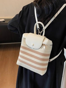 Women's summer straw backpack with contrasting cream leather and woven hollow stripes