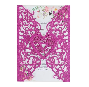 Detail of laser-cut rose red glitter invitation pocket with floral inner card