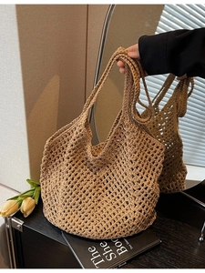 Light brown handmade crochet tote bag with hollow mesh design for summer vacation