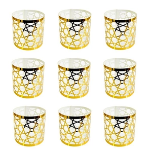 Nine-piece set of gold geometric hollow napkin rings with Islamic star patterns for decor