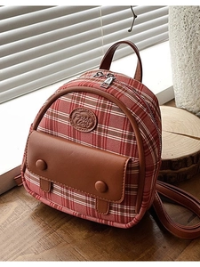 Mini vintage red plaid backpack with brown leather trim and dual zipper closure for women