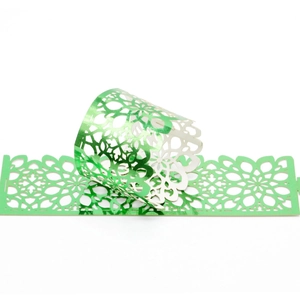 Green metallic laser-cut napkin ring with hollow floral mandala design for wedding decor