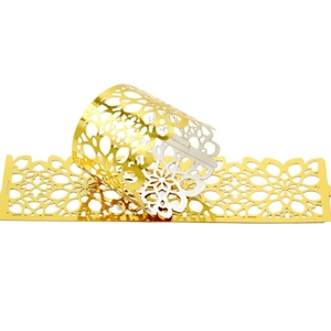 Elegant gold hollow laser-cut floral napkin ring for wedding and banquet table decor