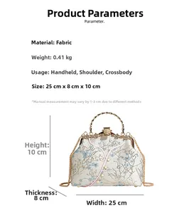 Detail view of floral embroidery handbag showing 25x8x10cm size and pearl lock mechanism