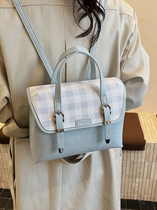 British style light blue checkered backpack with top handle and silver buckle details