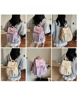Detailed views of high-capacity casual drawstring backpacks in lavender and cream colors