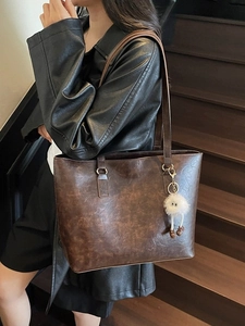 Minimalist brown large capacity leather tote bag with cute white plush charm detail