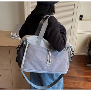 Detail of the NINGJIA large travel bag showing durable fabric and adjustable shoulder strap