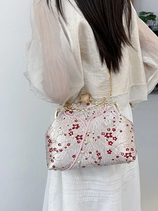 Elegant Chinese embroidery crossbody bag with floral pattern and pearl clasp for women