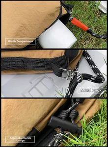 Detail of khaki nylon bag showing storage layer, metal hook, and elastic drawstring toggle