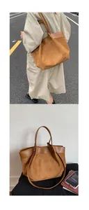 Detail of caramel leather tote bag with suede patchwork and long shoulder straps