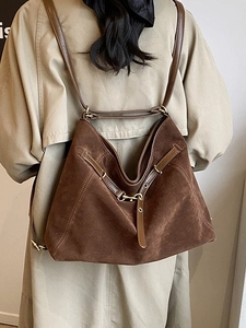 Large brown suede tote bag for women with gold hardware and stylish leather shoulder straps