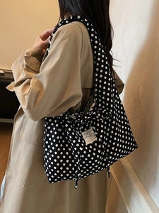 Large capacity black canvas tote bag with white polka dots for stylish commuting