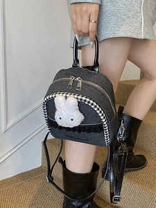 Sweet dark grey denim backpack featuring a plush rabbit design and black lace trim accents
