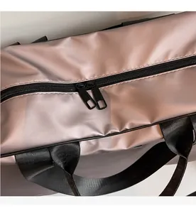 Close-up of smooth dual zippers on durable purple oxford fabric travel bag