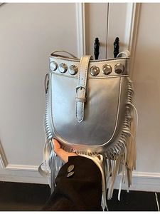 Silver fringe crossbody bag with metallic rivets and bohemian tassel design for women