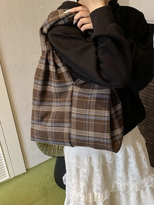 Vintage brown plaid tote bag with large capacity, worn by model for office commute