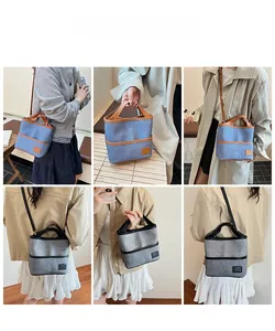 Collage de sacs seaux en toile bleu et gris avec bordure contrastée portés par modèle