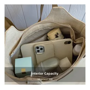 Top view of large beige tote bag interior showing spacious capacity and inner pockets