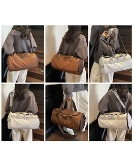 Détails du grand sac de sport avec bandoulière réglable et styles de transport variés