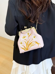 Pink embroidered silk crossbody bag with vintage gold floral clasp and chain strap