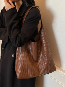 Brown woven leather hobo bag for women with large capacity and stylish shoulder strap