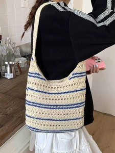Chic beige and blue striped crochet hobo bag for summer beach vacation and daily use