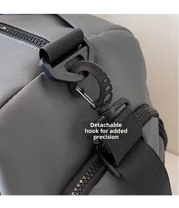 Detail of the durable grey waterproof fabric with detachable black metal hooks and strap