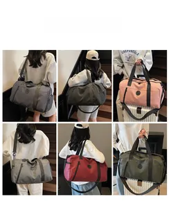 Detail view of large capacity travel bags in various colors with separate shoe compartment