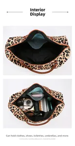 Detail view of large leopard print travel bag showing dry wet separation inner pocket