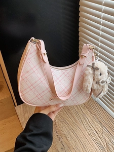 Pink and white checkered crescent hobo bag with a plush bunny charm and pearl detail