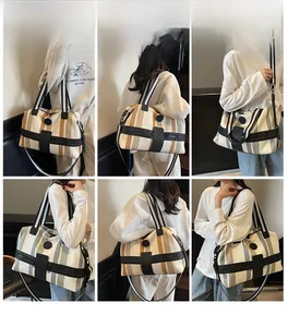 Detail shots of striped travel tote bag showing handheld and crossbody carrying styles