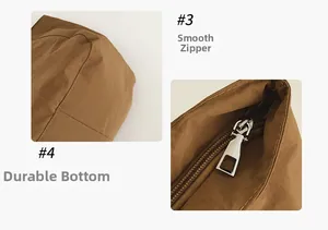 Detail of smooth metal zipper and reinforced bottom stitching on brown tote bag