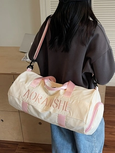 Large capacity cream travel duffel bag with pink straps and AORANSHE embroidery