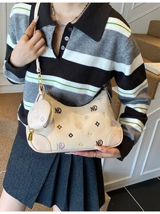 Chic cream dumpling shoulder bag with colorful letter patterns and mini coin purse