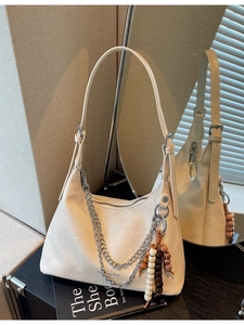 Creamy white lychee texture underarm bag with double silver chains and beaded pendant charm
