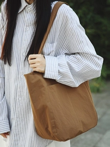 Brown nylon tote bag with wide strap, minimalist Japanese style large capacity shoulder bag