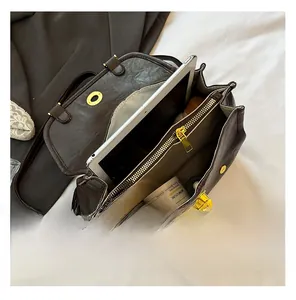 Interior view of the dark brown retro leather backpack showing a spacious main compartment