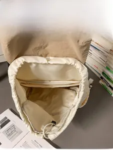 Internal view of a large drawstring backpack with a secure zippered pocket inside