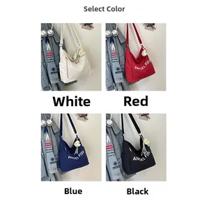 Collage of canvas tote bags in white, red, blue and black with Angel Fish print