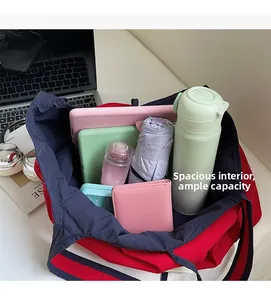 Macro shot of spacious nylon tote bag interior showing large capacity for laptop and daily items