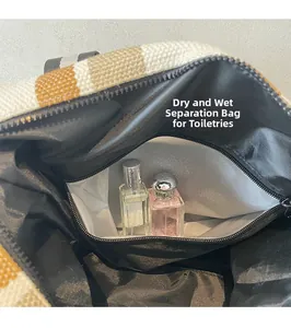 Detail view of the waterproof wet and dry separation bag inside the striped canvas tote