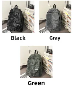 Detailed comparison of camouflage waterproof backpacks in black, gray, and green colors