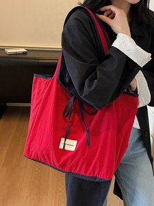 Red and blue oversized tote bag with LOVE MORNING patch and navy bow tie detail