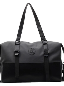Large gray waterproof nylon travel duffel bag with black handles and round logo patch