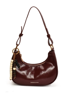 Vintage burgundy lacquer hobo bag with adjustable strap and decorative wooden beads