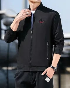 Close-up of a men's bomber jacket with CANADA embroidery and a zippered side pocket