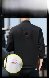 Detailed embroidery of maple leaf and Canada text on a black stand collar jacket