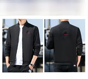 Detail of men's casual stand collar jacket with red ANAP embroidery on black fabric